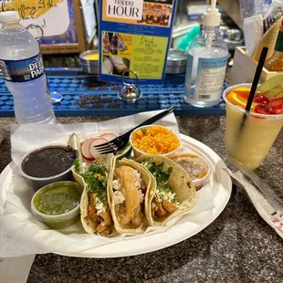 3 taco platter with mango margarita