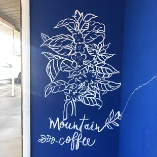 New Wall mural with the shop logo