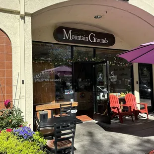 Storefront entrance with outdoor seating