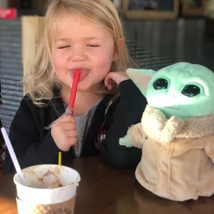 Kid drink- whipped topping and chocolate plus a candy stick