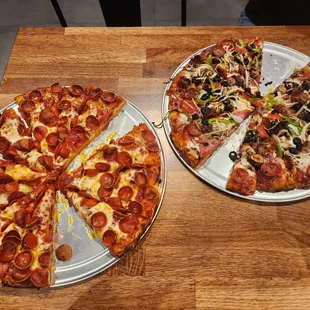 Two large pizzas! One pepperoni and one supreme