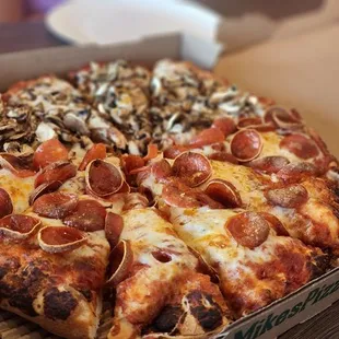 pepperoni, mushrooms, and cheese