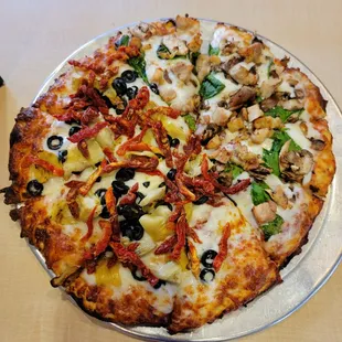 Medium 1/2 mushroom, chicken, spinach 1/2 sundried tomatoes, olives, anchovies