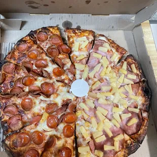 Half Classic Pepperoni Pizza , half ham &amp; pineapple.