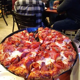 Having pizza with friends and family