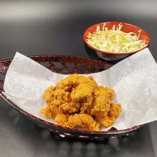 Sesame Chicken
 (Infused with a hint of curry - Served with Tempura Dipping Sauce and Cabbage Salad)