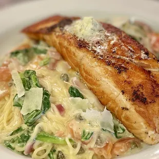 a plate of pasta and salmon