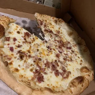 a slice of pizza in a box