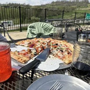 Vegetarian pizza with sausage added.  Blackberry cider for dessert.