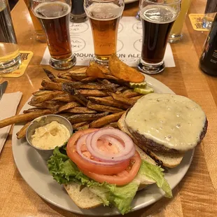 Impossible burger with sweet potato fries and jalapeño mayo, so good.