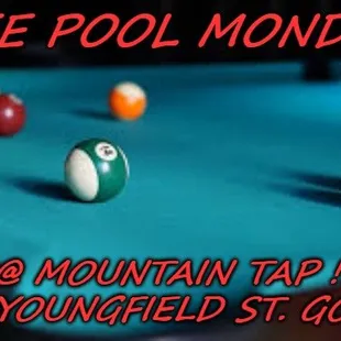 a pool table with pool balls