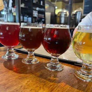 a row of glasses of beer