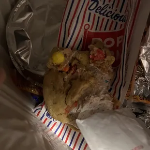 Birthday Bash cookie in the trash.