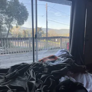 Can't even have our window open to enjoy the view As a surveillance camera is focused on the bed in this room.