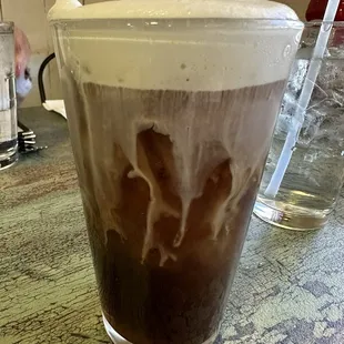 Iced coffee with white mocha and cold foam.