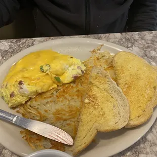 Western Omelette, hash browns, and toast.