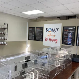 a counter with a sign that says donut only be happy