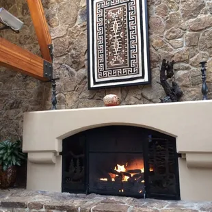a fireplace in the middle of the room