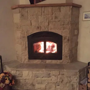 We removed an old, inefficient wood burning fireplace and replaced it with this high-efficiency fireplace.