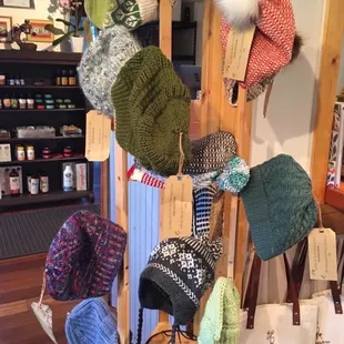a variety of hats and mittens