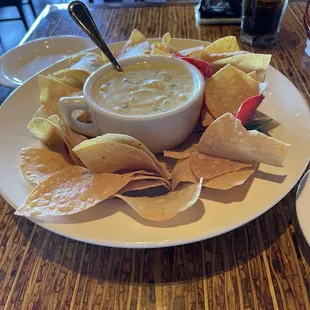 Chips and artichoke dip.