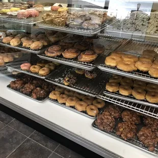 Donut counter: apple fritters and cinnamon roll donuts are huge!