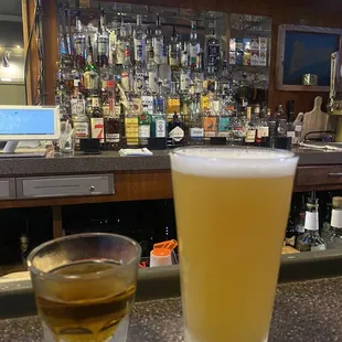 a pint and a glass of beer