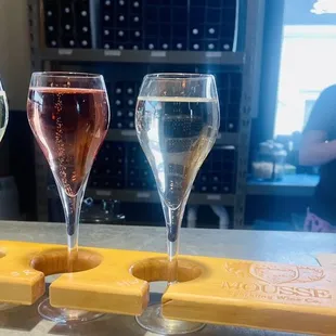 Wine tasting flights with our super sweet host in the back.