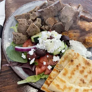 Lamb platter with taziki, pita, fries and a side Greek salad