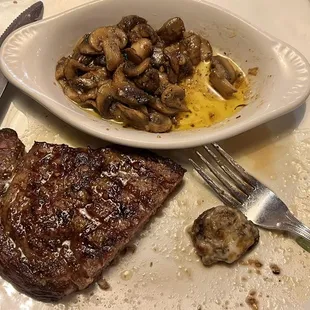 Ribeye steak with mushrooms