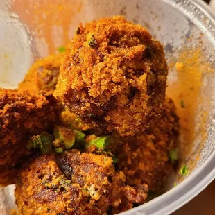 Boudin balls $9 . I always order when I'm in town . Very good .