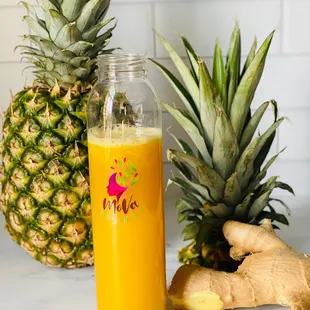 a pineapple and a pineapple juice