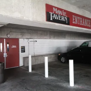 The entrance from the parking garage (almost at the top of the parking garage in the same building).  Movie Tavern validates.