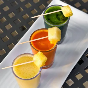 Shots trio: wheatgrass, turmeric and ginger