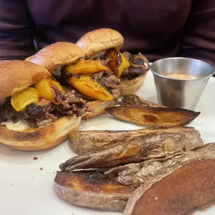 Lunch menu: peach short rib sliders with potato wedges