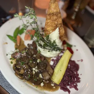 Half a plate of Steak my Husband got the other half