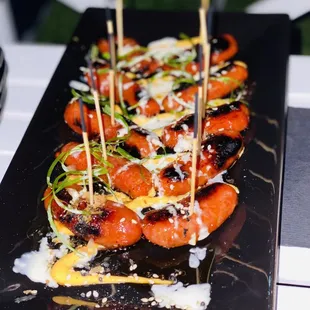 a platter of grilled carrots