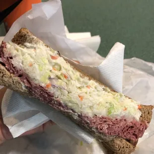 &quot;Sloppy Irish&quot; on toasted wheat with NO mustard, instead add mayo. This sandwich comes with sliced corned beef, coleslaw and provolone.