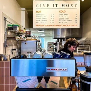 a woman sitting at the counter