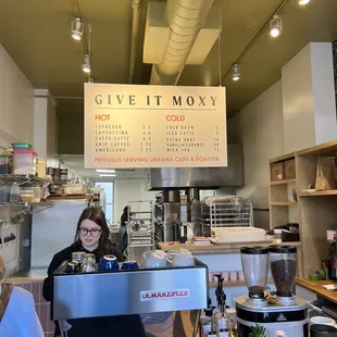a woman behind the counter