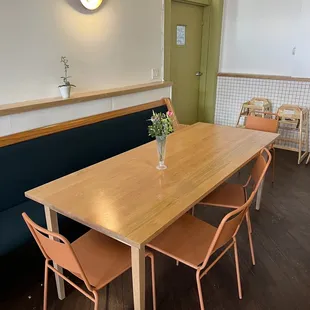 a wooden table and chairs