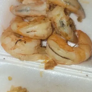 a plate of shrimp and rice