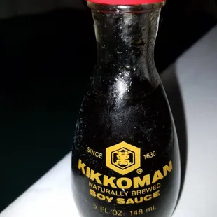 a bottle of kikkoman soy sauce