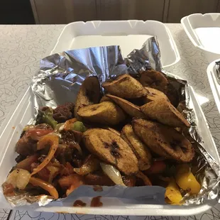 Goat,plantains and onions and peppers