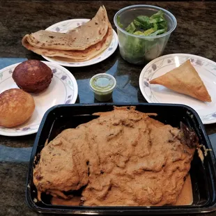 Samaki wa Kupaka (golden pompano) in coconut sauce with salad and chapati, Mahamri x2, Sambusa