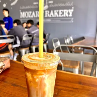 a cup of bubble tea on a table
