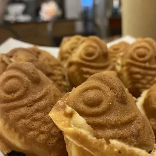 a plate of pastries and a glass of milk