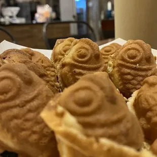 a plate of pastries and a glass of milk