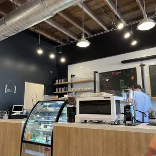 Looking toward back of store. Check out station on the left, with pastry case next to it.