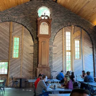 Gorgeous arched walls and weirdly gigantic clock.